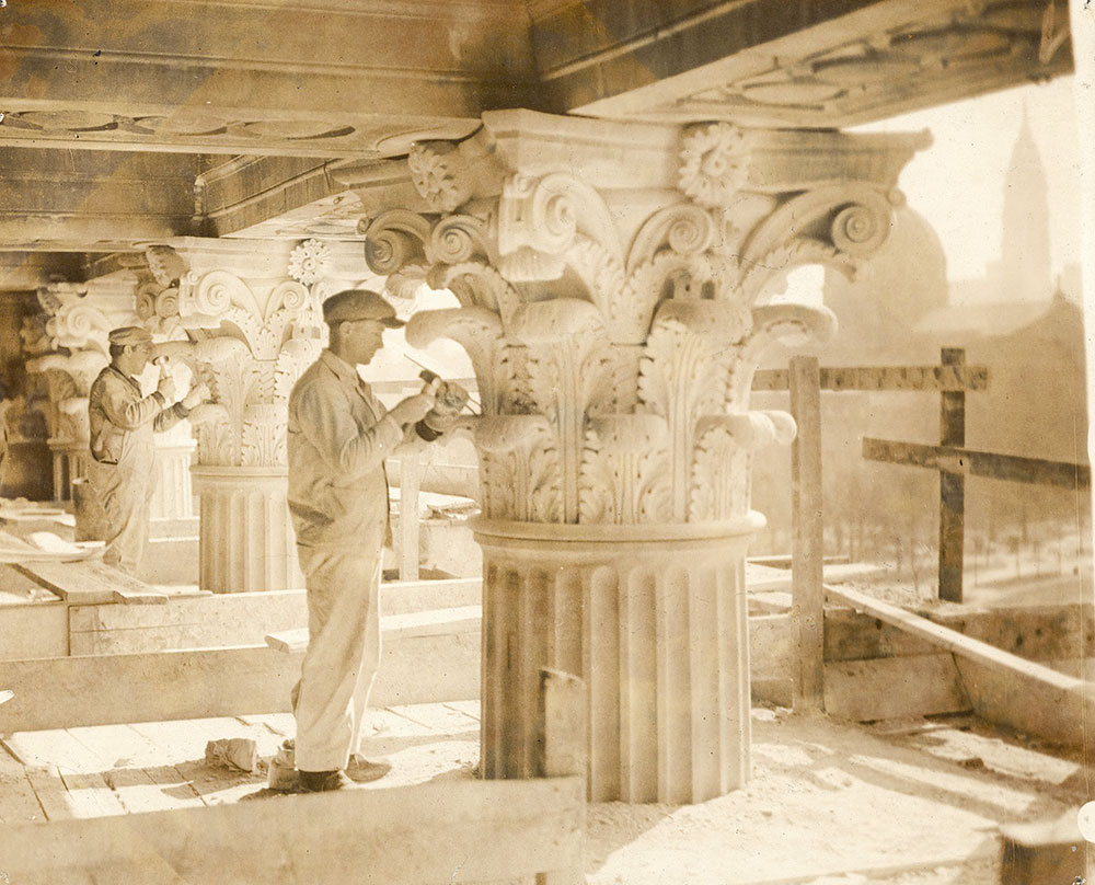 Stone carvers from the John Donnelly Company completing Corinthian capitals at the Central Library of the Free Library of Philadelphia, ca. 1924-1925