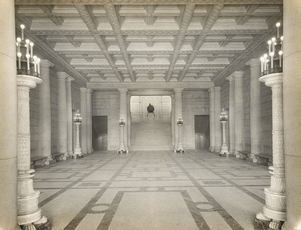 Main Entrance Hall of the Central Library of the Free Library of Philadelphia looking toward stairway with the Dr. William Pepper statue on the stairway landing