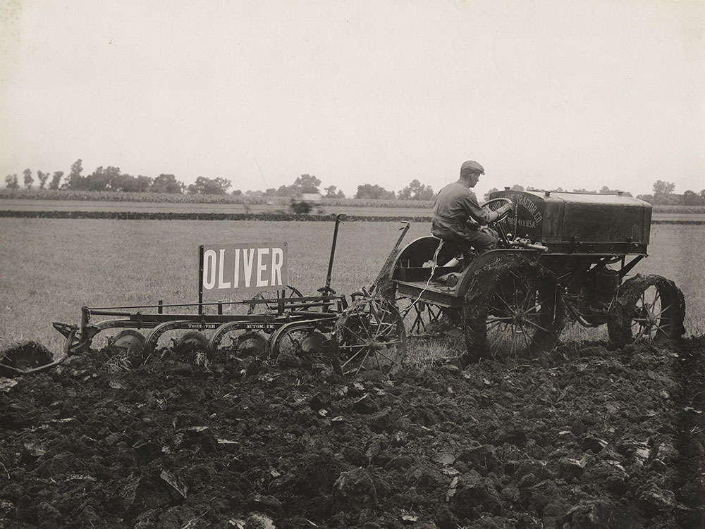 The Oliver Automatic pulled by Four Drive tractor