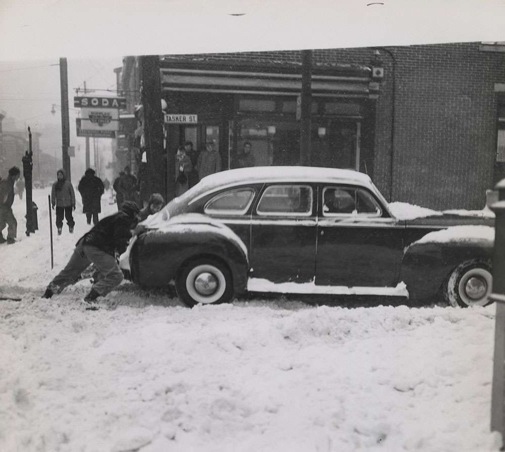 Dodge stuck in snow on Tasker St.