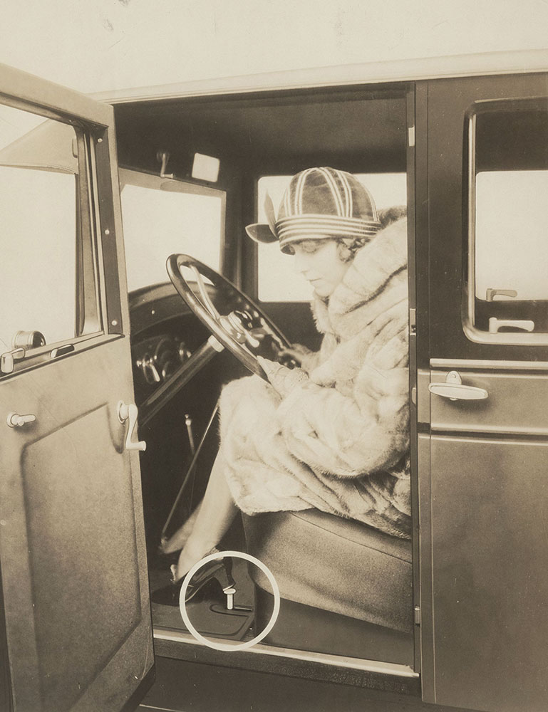 Chandler 1926 (?) Interior, showing lady demonstrating ease of use of the 