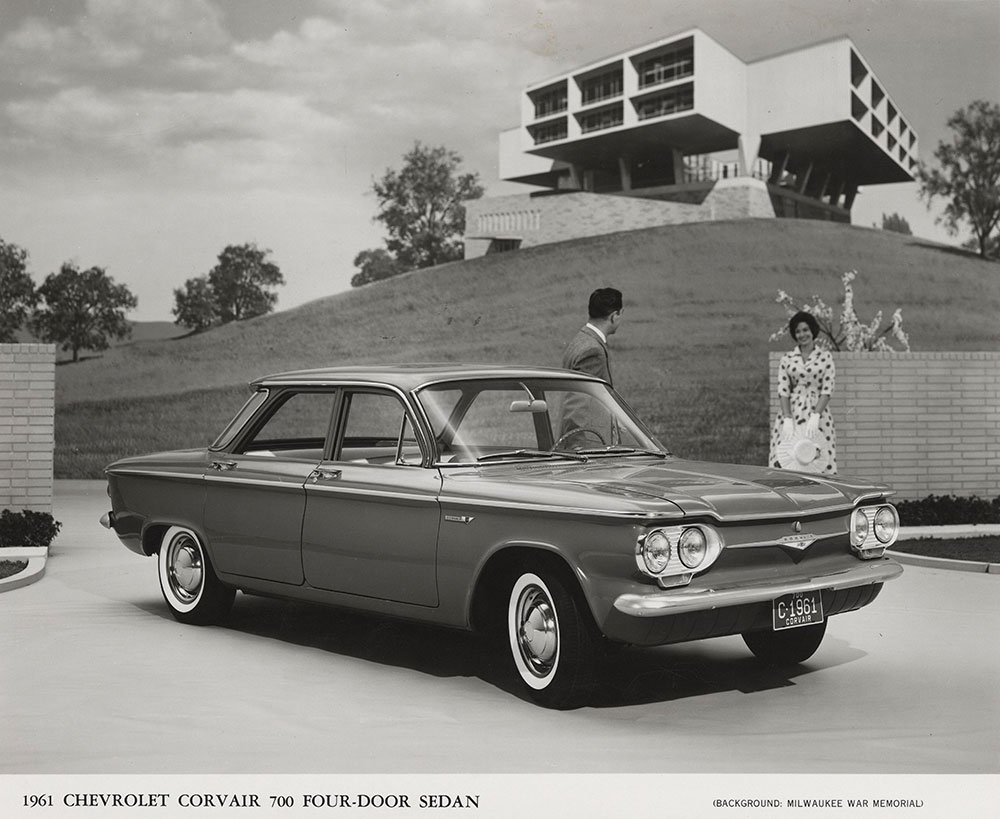Chevrolet - 1961 - Corvair 700 four-door sedan, in front of Milwaukee War Memorial