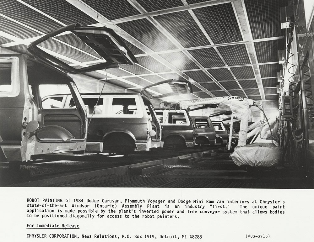 Robot painting of 1984 Dodge Caravan and Plymouth Voyager and the Dodge Mini Ram Van interiors at Chrysler's  Windsor Assembly Plant.