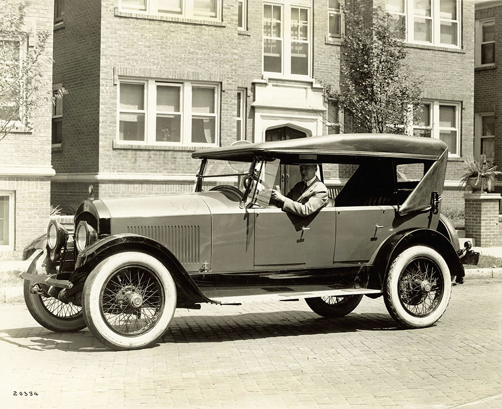 Howard (Howdy) Wilcox at wheel of Cole Aero- eight- 1921
