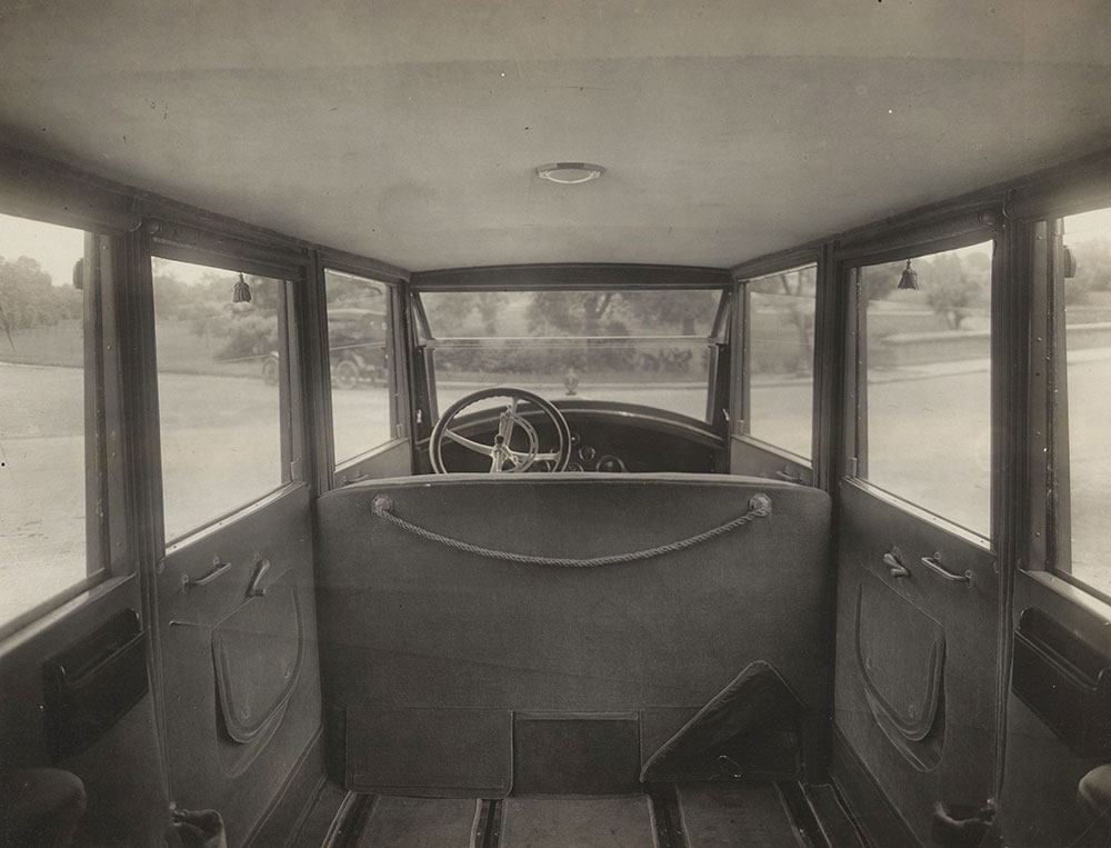 Interior of Cole Aero- Eight TourSedan- showing Auxiliary seats placed out of sight beneath solid front seat. 1920