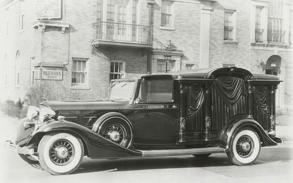 Cunningham carved 8 column hearse, with central dome, built on Cadillac chassis, 1931.