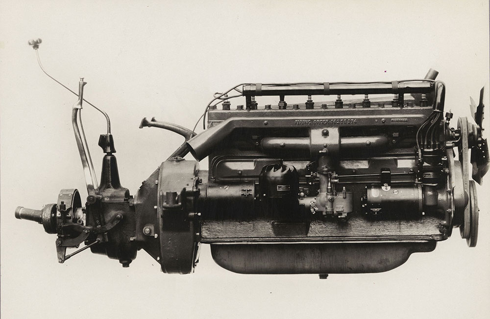 Diana Eight motor. Right hand side showing exhaust and intake manifold also simplicity and accessibility of electrical equipment, carburetor and air cleaner, 1926.