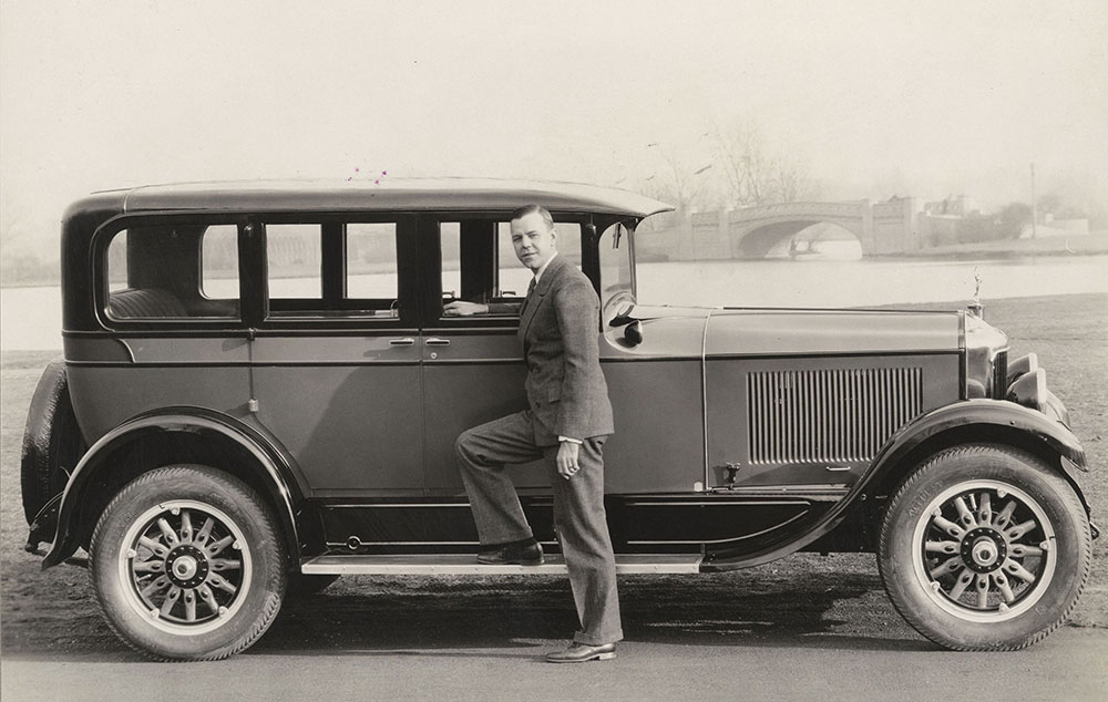 Diana, 1926. F. H. Rengers, General Sales Manager, Moon Motor Car Company and the new Diana four door DeLuxe Arrowhead Sedan for 1926.