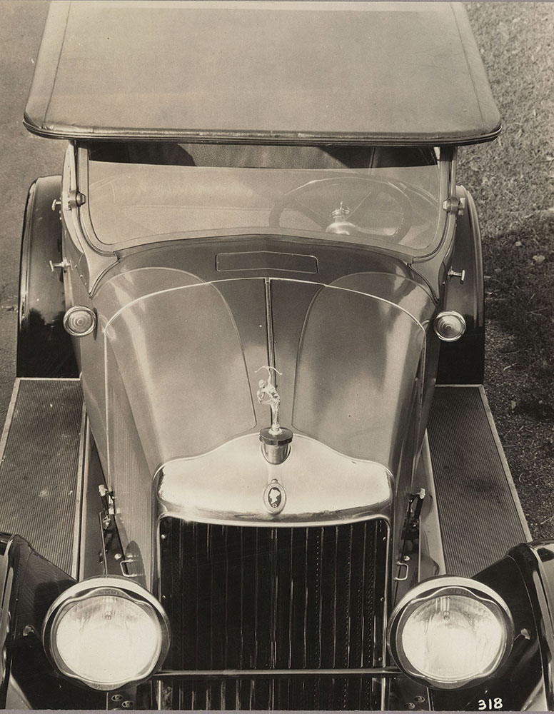 Diana: Head on overhead view of the new Diana five passenger Arrowhead Phaeton showing the arrow head offset panel effect on the radiator and cowl, 1926.