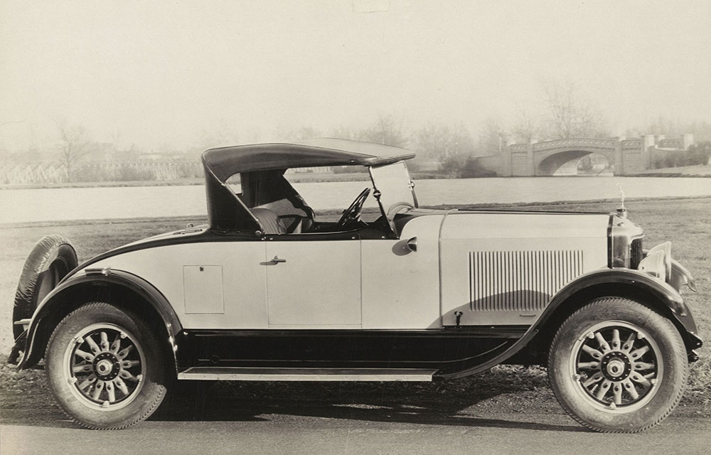 Diana Light Straight Eight. Black and Cream Roadster for 1926. Rumble seat closed, showing aluminum access steps.