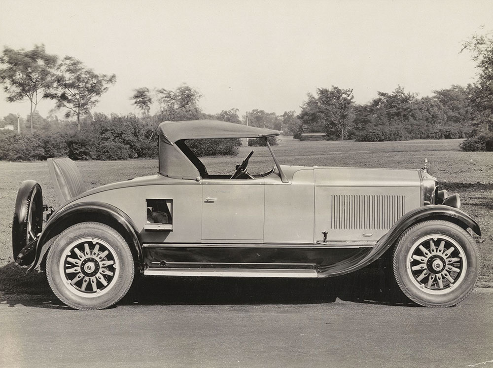 Diana: Right side view Diana 8 Roadster showing rumble seat up and luggage compartment door down, 1925.