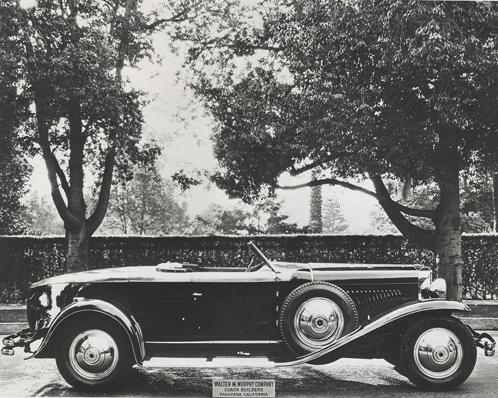 Duesenberg Model J boat-tail speedster with bodywork by Walter M. Murphy Coach Builders, with top down