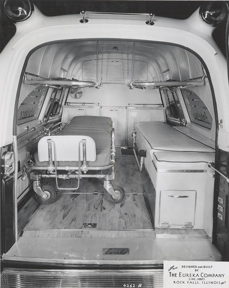 Eureka Company, rear compartment of ambulance, showing gurney: 1957