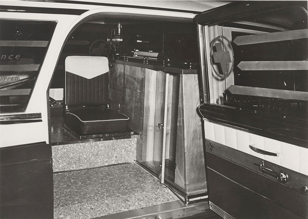 Eureka ambulance, showing attendant's seat in rear compartment.