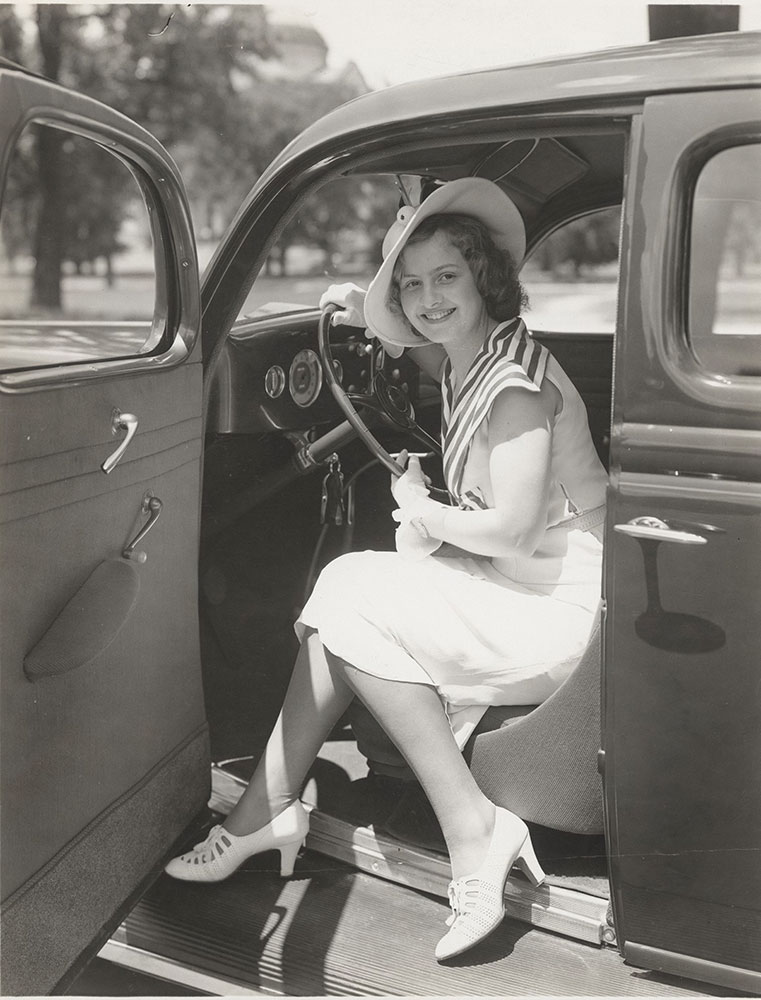 Ford V-8 Touring Sedan, showing front interior and a nice pair of heels - 1935