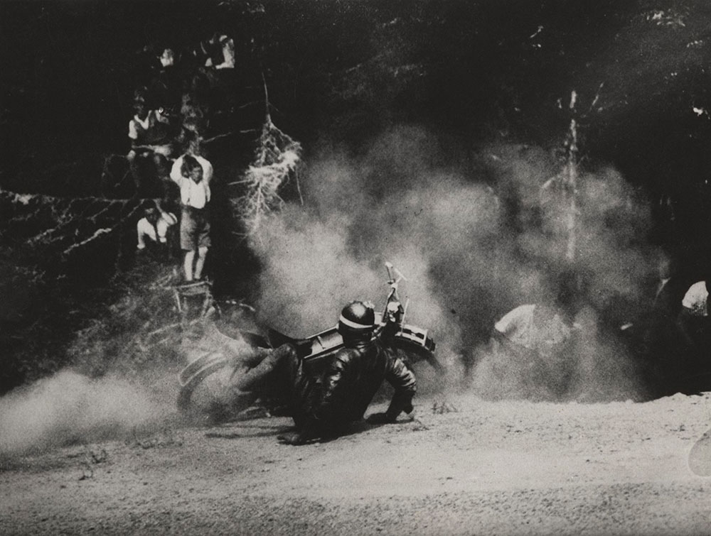 Motorcycle racer spills