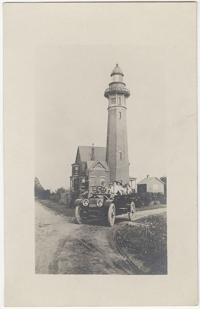 Car in front of Lighthouse