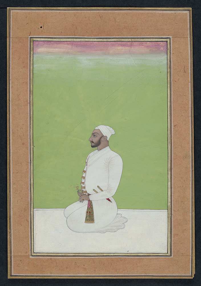 Portrait of an Unidentified Mughal Nobleman Seated Holding a Flower