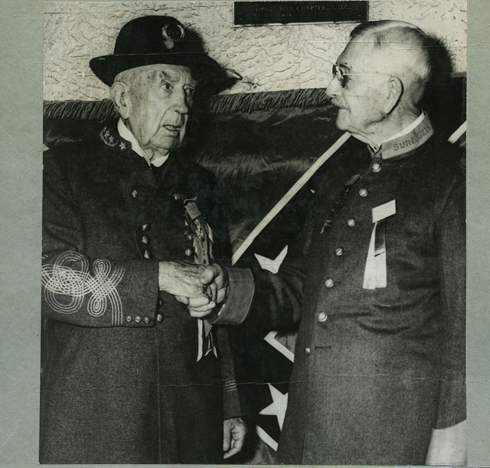 General Moore Congratulated by Dr. W.H. Scudder.