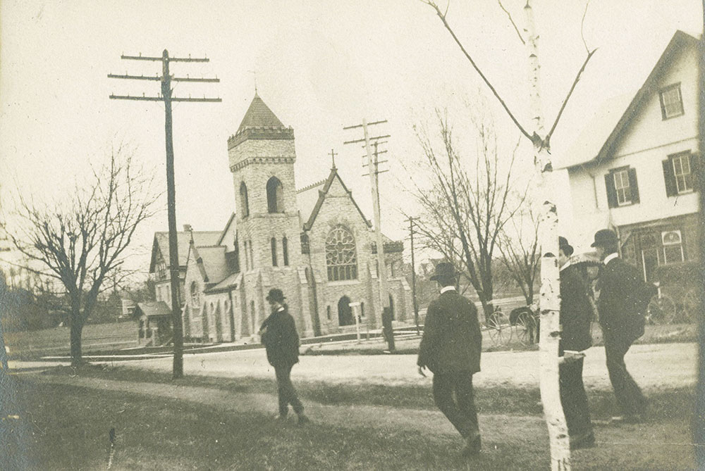 Men passing Church