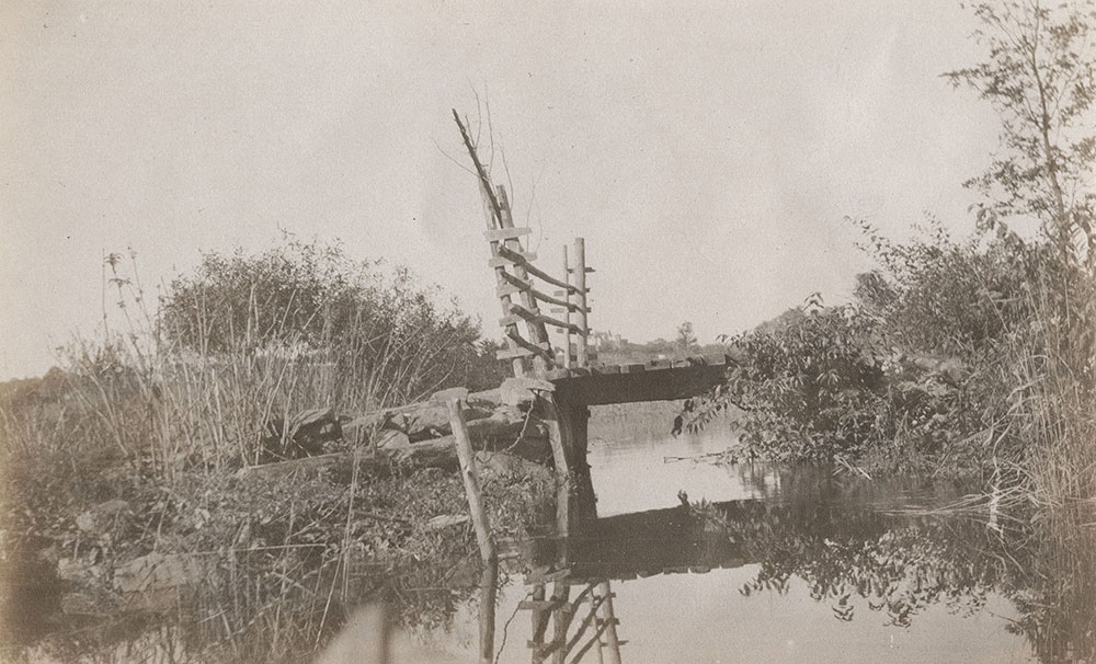 Creek and wooden bridge