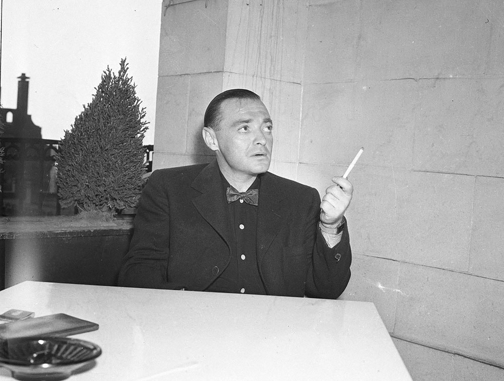 Man at a table smoking