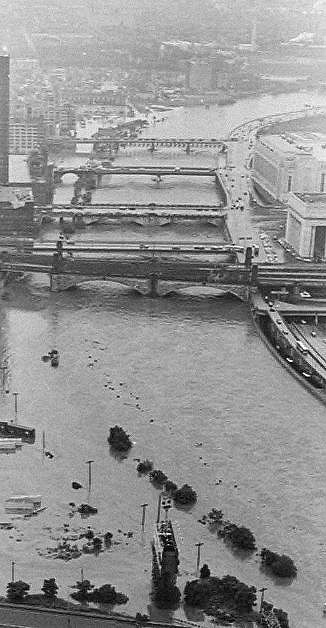 Aerials flooding Schuylkill River between South and Vine Street bridges