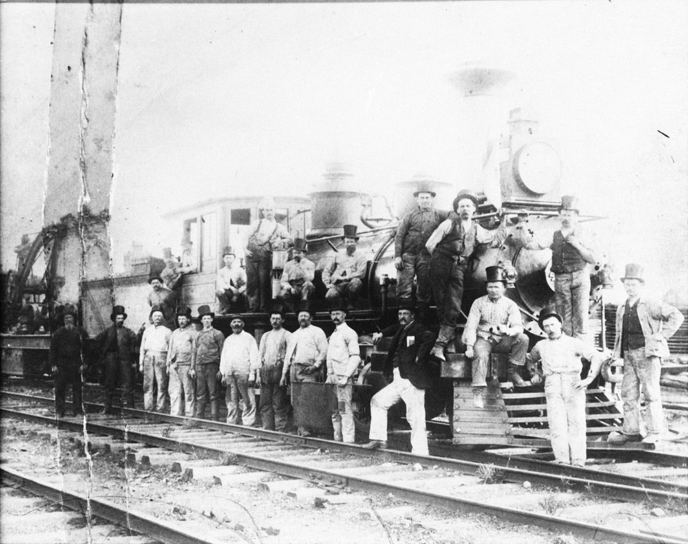 Steam train and workers